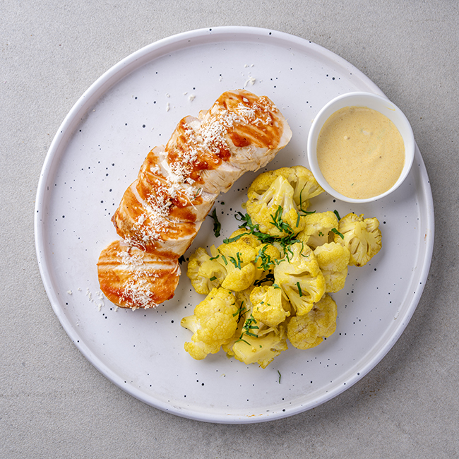 Baked Feta & Caper-stuffed Chicken With Turmeric Cauliflower & Lemon Sauce